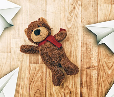 Teddy bear on real wood floor
